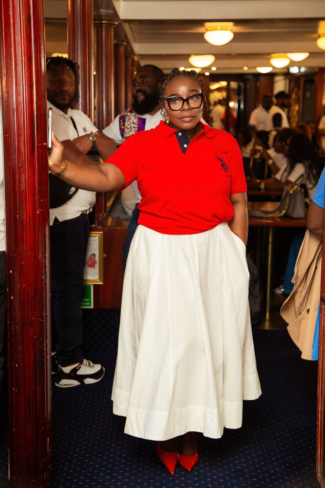 A full dance floor of guests in polo colours on the Polo Boat Party cruise